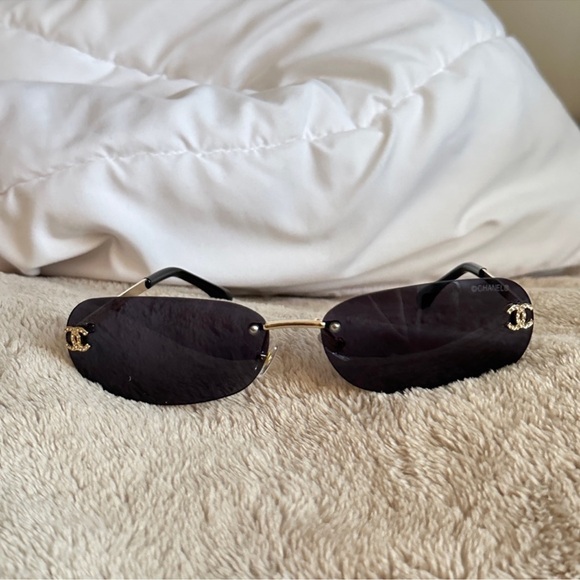 CHANEL Black and Gold Rimless Sunglasses - Picture 1 of 5